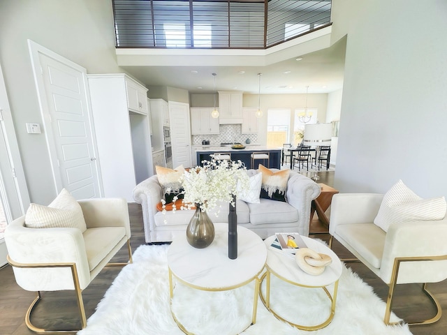 1002 Kennedy Dr, Allen, TX 75013 - living area featuring a towering ceiling and wood finished floors