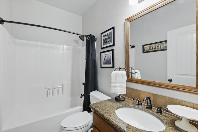 2210 Ridgewood Dr, Bridgeport, TX 76426 - bathroom featuring shower / bath combo with shower curtain, vanity, and toilet
