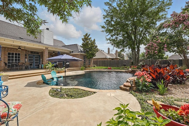 2210 Ridgewood Dr, Bridgeport, TX 76426 - view of pool with a fenced backyard, a patio area, and a ceiling fan