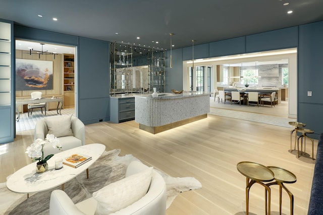 3906 Shenandoah St, Highland Park, TX 75205 - bar featuring recessed lighting, light wood finished floors, and a chandelier