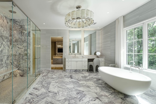 3906 Shenandoah St, Highland Park, TX 75205 - full bath featuring a shower stall, tile walls, marble tiled floors, vanity, and a soaking tub