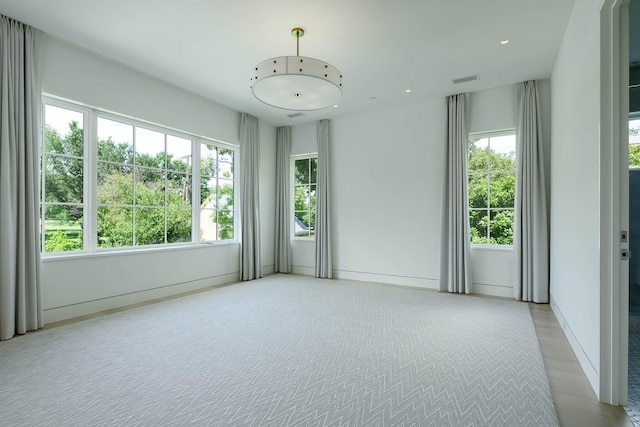 3906 Shenandoah St, Highland Park, TX 75205 - unfurnished room with healthy amount of natural light and baseboards