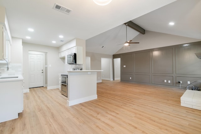 7300 Frances Ct, North Richland Hills, TX 76182 - kitchen featuring appliances with stainless steel finishes, decorative backsplash, open floor plan, light wood-style floors, and recessed lighting