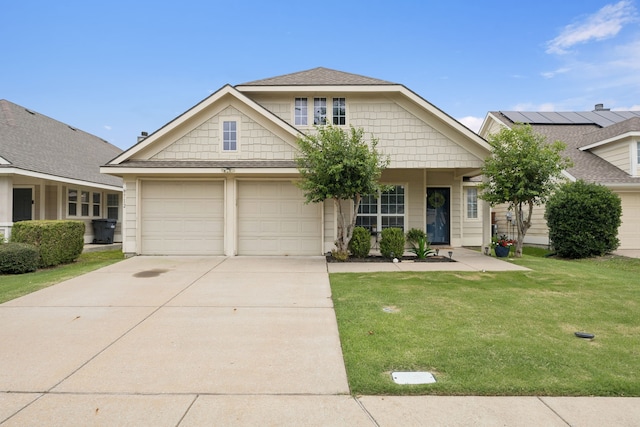 9712 Hedge Bell Dr, Mckinney, TX 75072 - view of front of house with a front lawn and driveway