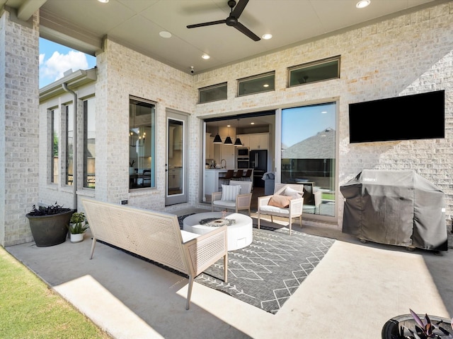 2617 Eclipse Pl, Celina, TX 75009 - view of patio / terrace with area for grilling, an outdoor living space with a fire pit, and a ceiling fan