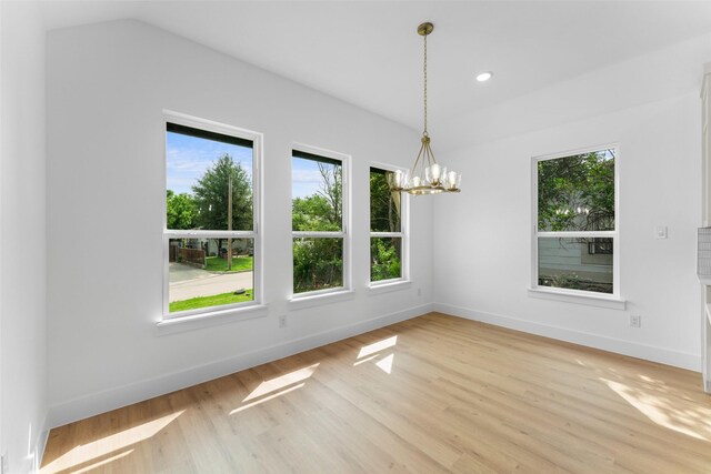 2915 NW Loraine St, Fort Worth, TX 76106 - spare room with a chandelier, baseboards, light wood finished floors, and recessed lighting