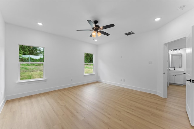 2915 NW Loraine St, Fort Worth, TX 76106 - spare room with light wood-style floors, ceiling fan, baseboards, recessed lighting, and a smoke detector