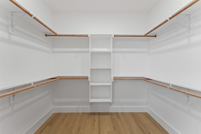 2915 NW Loraine St, Fort Worth, TX 76106 - walk in closet featuring wood finished floors