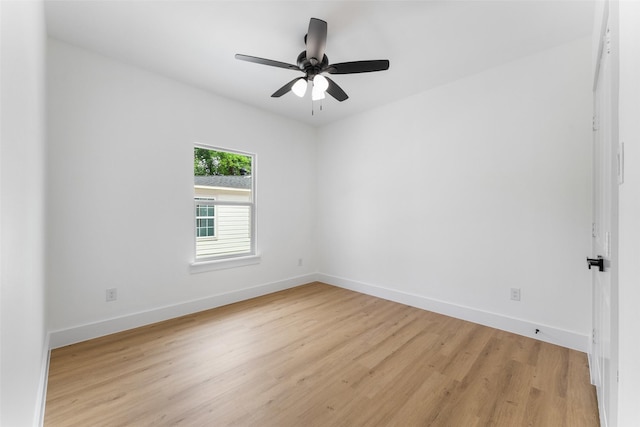 2915 NW Loraine St, Fort Worth, TX 76106 - unfurnished room with light wood-style floors, baseboards, and ceiling fan