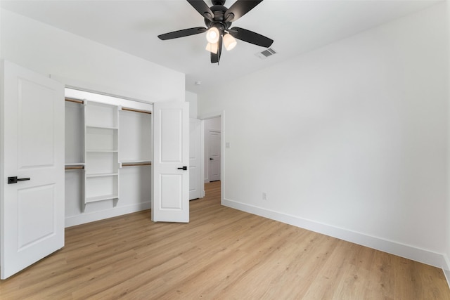 2915 NW Loraine St, Fort Worth, TX 76106 - unfurnished bedroom featuring baseboards, light wood-style floors, a closet, and a ceiling fan