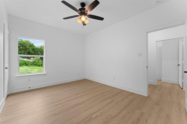 2915 NW Loraine St, Fort Worth, TX 76106 - unfurnished room featuring light wood-type flooring, ceiling fan, and baseboards