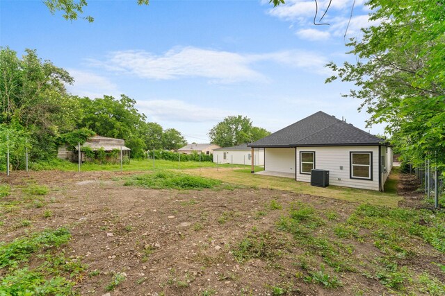 2915 NW Loraine St, Fort Worth, TX 76106 - view of yard featuring central AC unit and fence