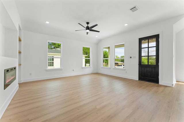2915 NW Loraine St, Fort Worth, TX 76106 - unfurnished living room with light wood-type flooring, ceiling fan, recessed lighting, and baseboards