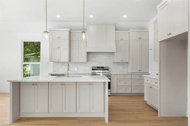 2915 NW Loraine St, Fort Worth, TX 76106 - kitchen featuring stainless steel electric range oven, a sink, premium range hood, backsplash, and recessed lighting