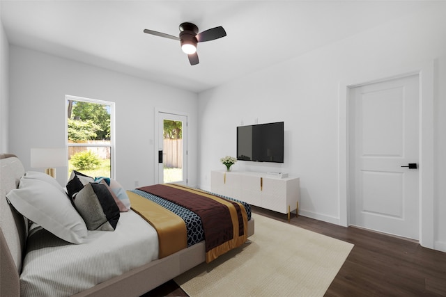 2535 Exline St, Dallas, TX 75215 - bedroom featuring wood finished floors, ceiling fan, and baseboards