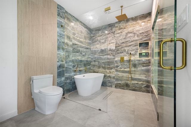 2535 Exline St, Dallas, TX 75215 - full bathroom with a shower with shower door, a freestanding bath, tile walls, and toilet