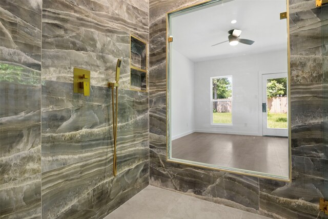 2535 Exline St, Dallas, TX 75215 - bathroom featuring ceiling fan and a shower