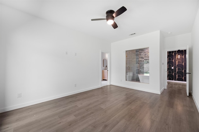 2535 Exline St, Dallas, TX 75215 - unfurnished living room featuring wood finished floors, ceiling fan, and baseboards