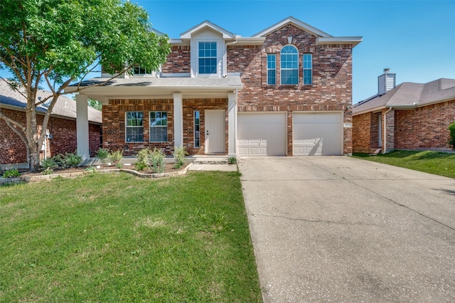9316 Norfolk Ln, Mckinney, TX 75071 - traditional home featuring brick siding, a front lawn, driveway, an attached garage, and covered porch