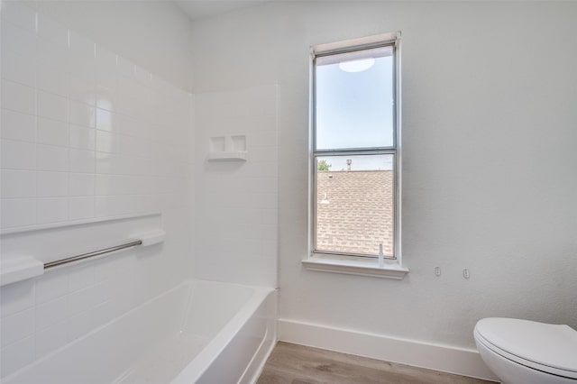 9316 Norfolk Ln, Mckinney, TX 75071 - full bath featuring wood finished floors, baseboards, and toilet