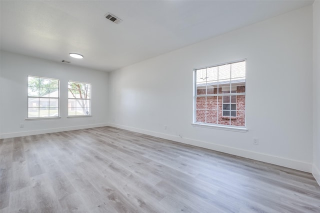 9316 Norfolk Ln, Mckinney, TX 75071 - spare room with baseboards and light wood-style floors