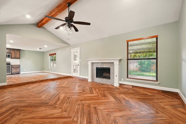unfurnished living room featuring a tile fireplace, baseboards, ceiling fan, and recessed lighting