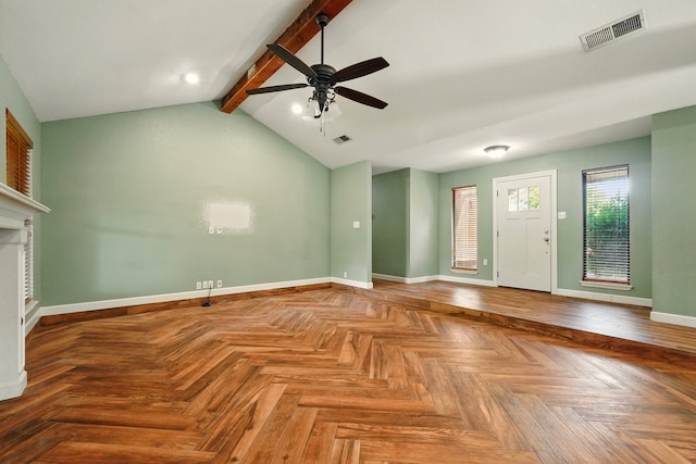 unfurnished living room with a ceiling fan, baseboards, and a fireplace