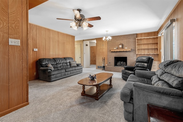303 Luby Dr, Tom Bean, TX 75489 - living room featuring ceiling fan, wooden walls, carpet, built in features, and a fireplace