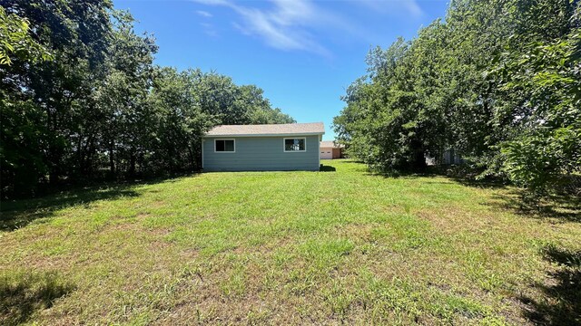 303 Luby Dr, Tom Bean, TX 75489 - view of green lawn