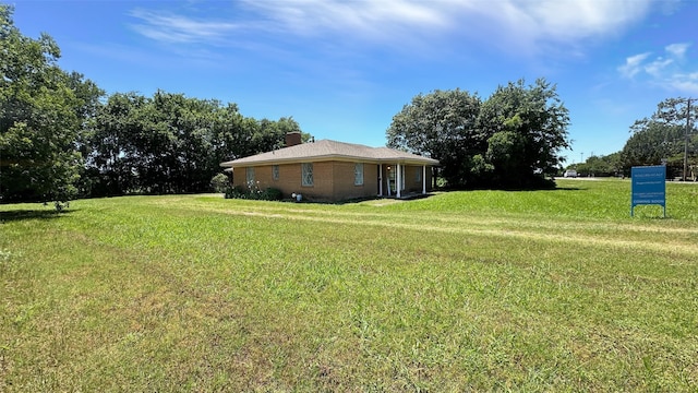 303 Luby Dr, Tom Bean, TX 75489 - view of green lawn
