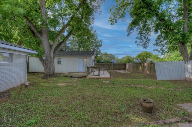 view of yard featuring a deck