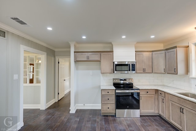 kitchen featuring appliances with stainless steel finishes, light stone countertops, tasteful backsplash, baseboards, and ornamental molding