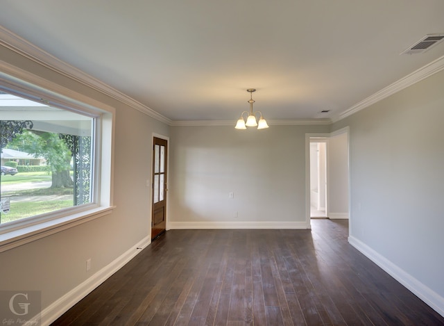 unfurnished room featuring a chandelier, dark wood-type flooring, crown molding, and baseboards