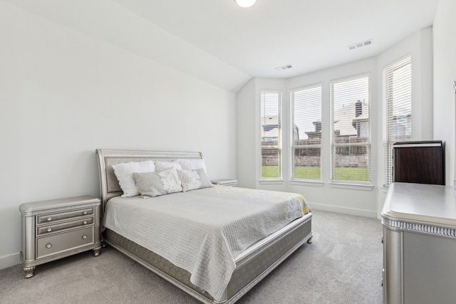 1654 Castleford Dr, Forney, TX 75126 - carpeted bedroom with multiple windows, baseboards, and vaulted ceiling