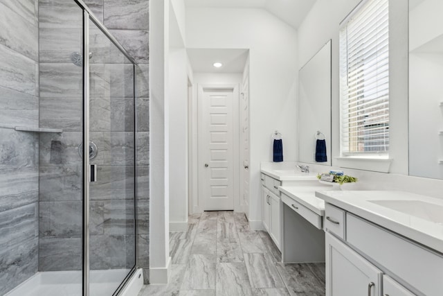 1654 Castleford Dr, Forney, TX 75126 - full bath with a shower stall, vanity, marble finish floors, lofted ceiling, and recessed lighting