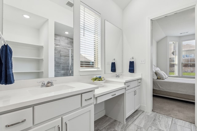 1654 Castleford Dr, Forney, TX 75126 - ensuite bathroom with a stall shower, vanity, marble look tile flooring, and recessed lighting