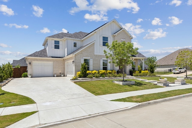 1421 Maplewood Dr, Prosper, TX 75078 - view of front of home with board and batten siding, driveway, brick siding, an attached garage, and roof with shingles