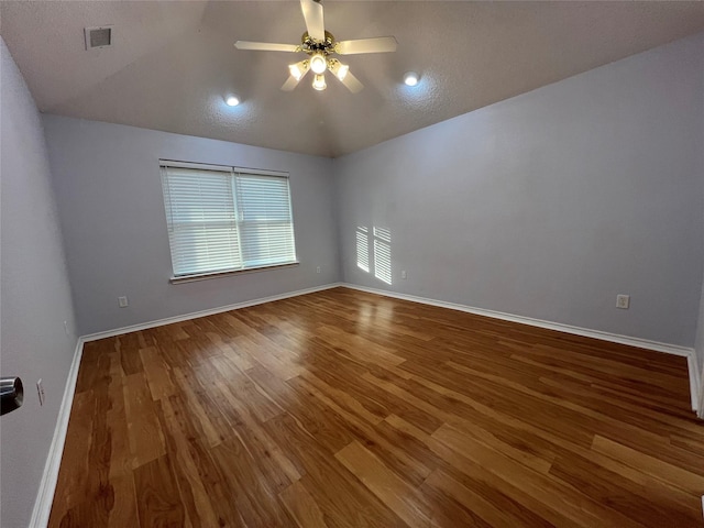 920 Joshua Dr, Burleson, TX 76028 - unfurnished room featuring wood finished floors, a ceiling fan, baseboards, and vaulted ceiling