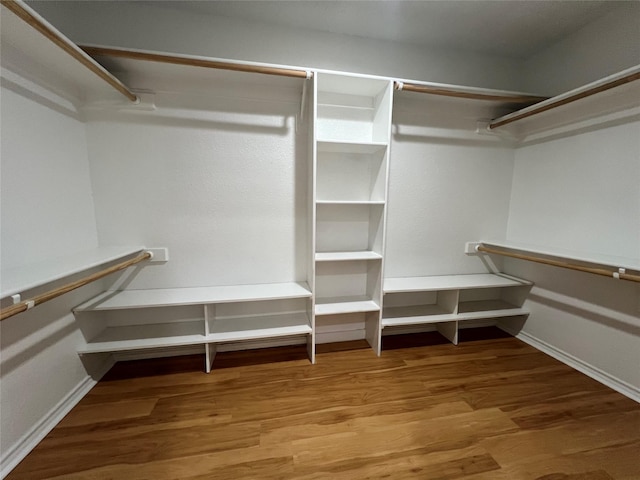 920 Joshua Dr, Burleson, TX 76028 - walk in closet featuring wood finished floors