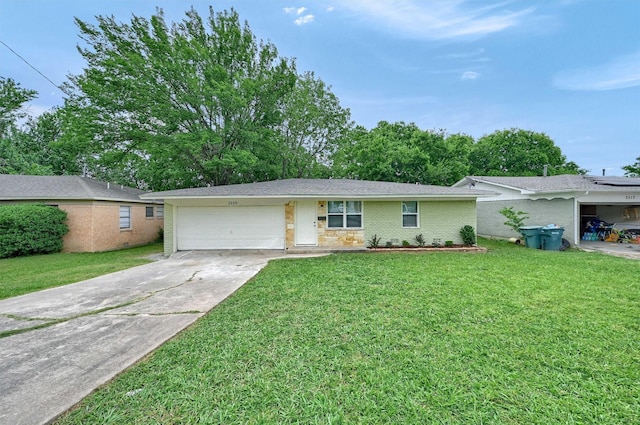 2519 N Hickory St, Sherman, TX 75092 - single story home featuring an attached garage, concrete driveway, a front yard, and brick siding