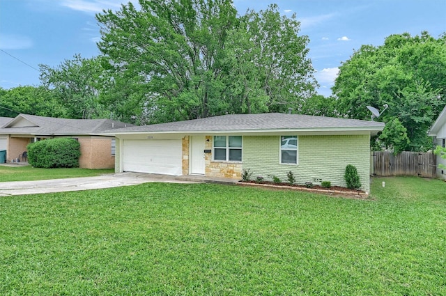 2519 N Hickory St, Sherman, TX 75092 - ranch-style home featuring a garage, concrete driveway, and brick siding