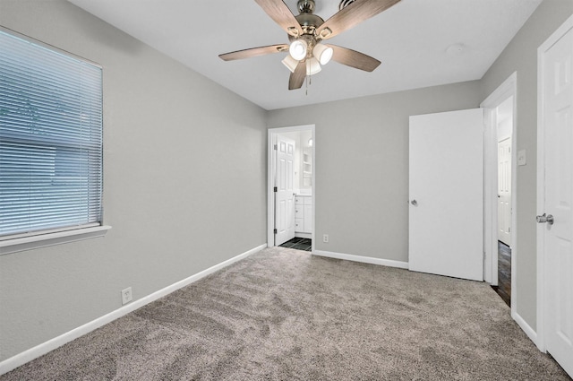 2519 N Hickory St, Sherman, TX 75092 - unfurnished bedroom with carpet flooring, baseboards, a ceiling fan, and ensuite bathroom