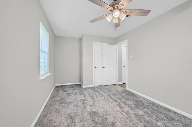 2519 N Hickory St, Sherman, TX 75092 - unfurnished bedroom featuring baseboards, carpet, a closet, and a ceiling fan