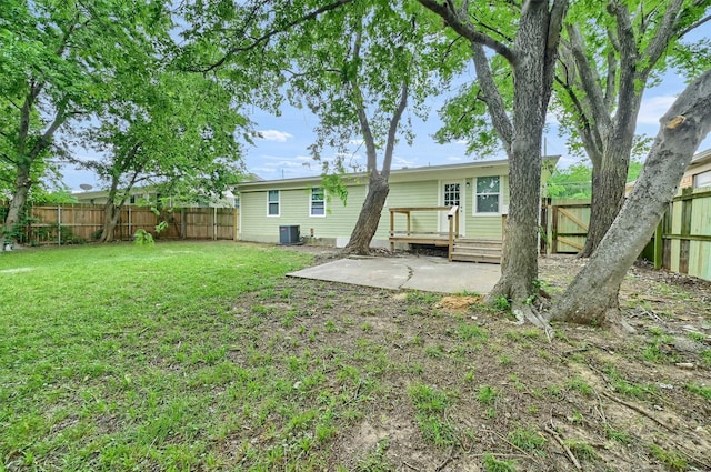 2519 N Hickory St, Sherman, TX 75092 - rear view of house featuring a patio area, cooling unit, and a wooden deck