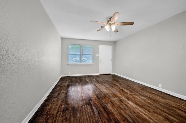 2519 N Hickory St, Sherman, TX 75092 - empty room featuring a textured wall, baseboards, ceiling fan, and wood finished floors