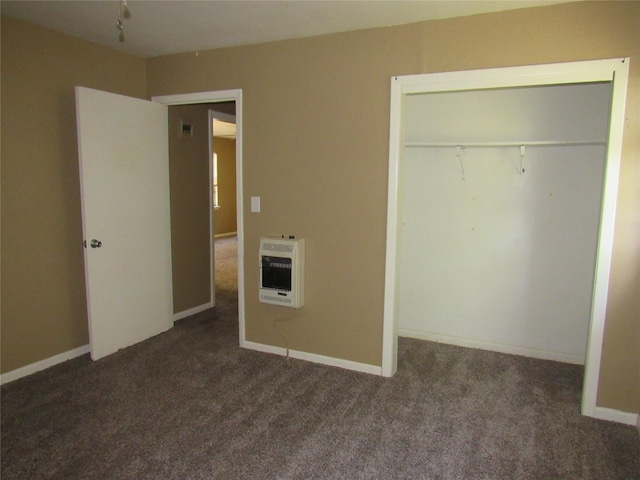 344 Castle Dr, Pottsboro, TX 75076 - unfurnished bedroom featuring heating unit, carpet flooring, a closet, and track lighting