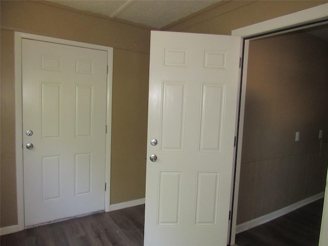 344 Castle Dr, Pottsboro, TX 75076 - entrance foyer with dark wood-style floors and baseboards