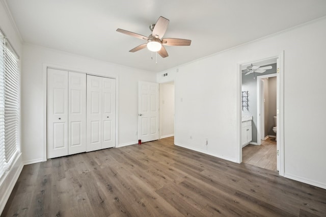 8609 N Normandale St, Fort Worth, TX 76116 - unfurnished bedroom with wood finished floors, a closet, a ceiling fan, ensuite bath, and ornamental molding