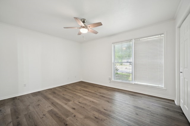 8609 N Normandale St, Fort Worth, TX 76116 - empty room featuring ceiling fan, dark wood-style floors, and crown molding