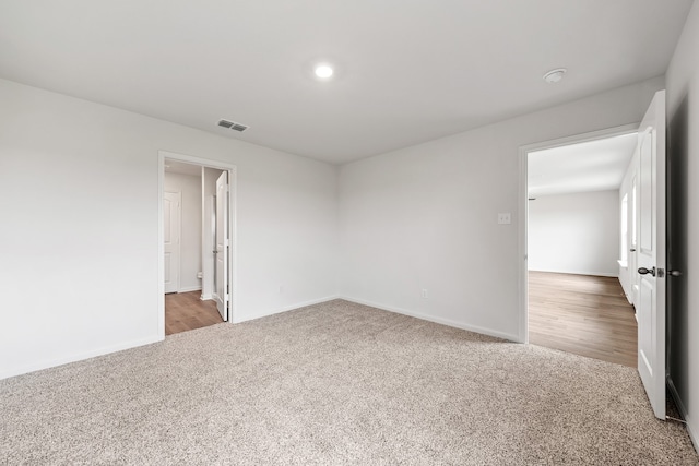 4703 Fillmore Dr, Greenville, TX 75401 - carpeted spare room with baseboards and recessed lighting
